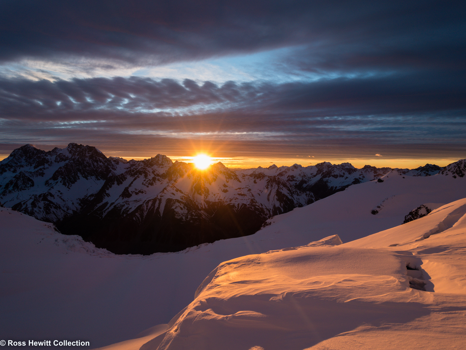 First Rays of sun from Aoraki Mount Cook NZ by Ross Hewitt